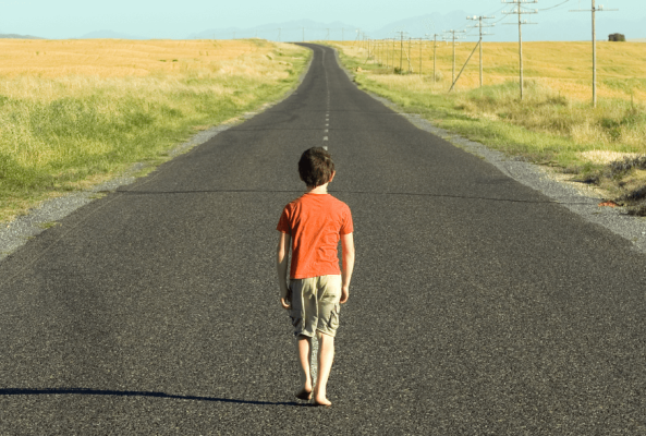 Child walking on a long road, representing the long journey of CMPA